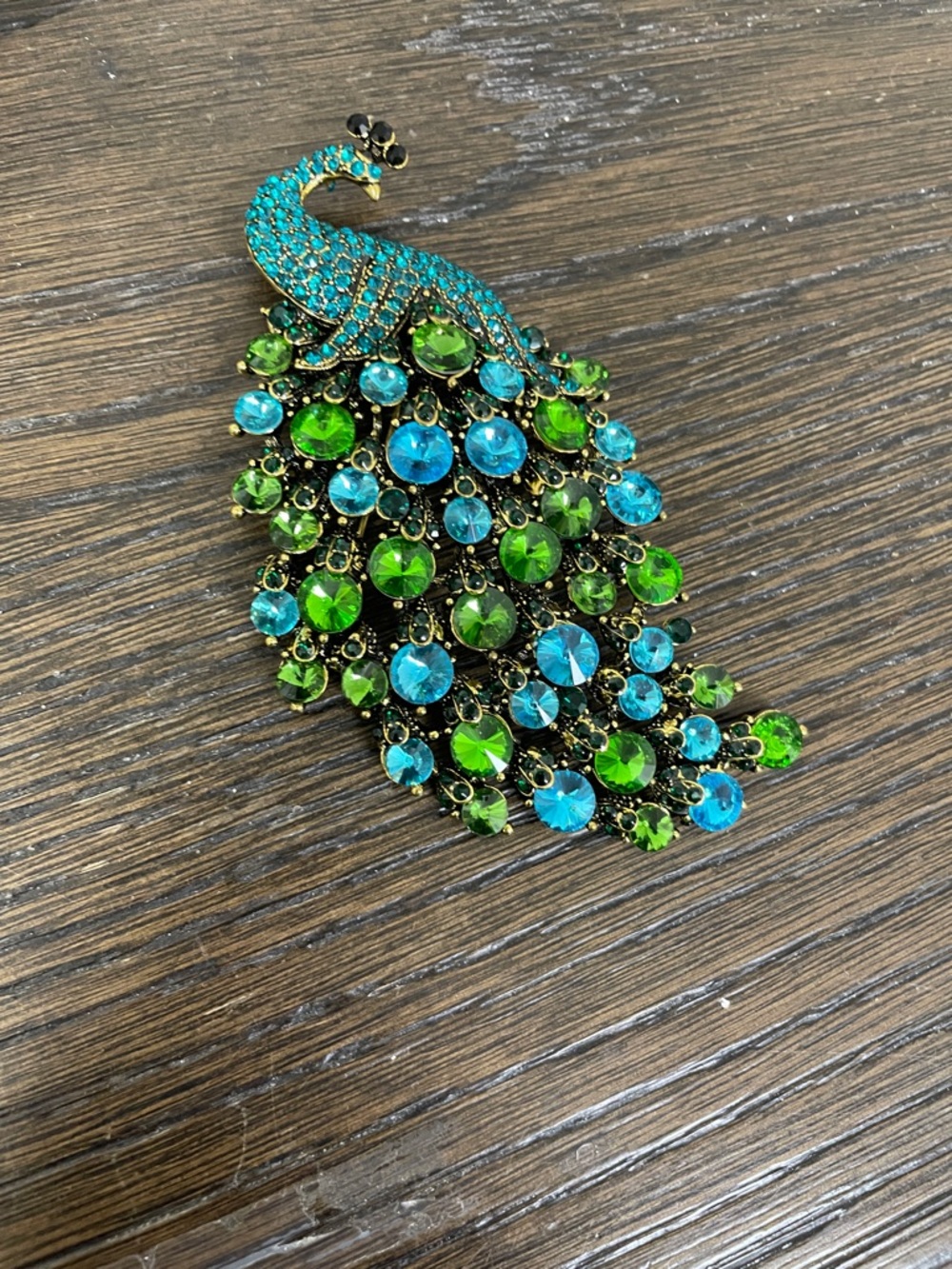 Peacock brooch